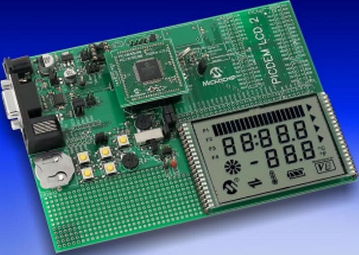 DM163030, PICDEM LCD 2 Demonstration Board shows the main features of LCD Flash PIC microcontrollers including the LCD voltage booster and contrast controller